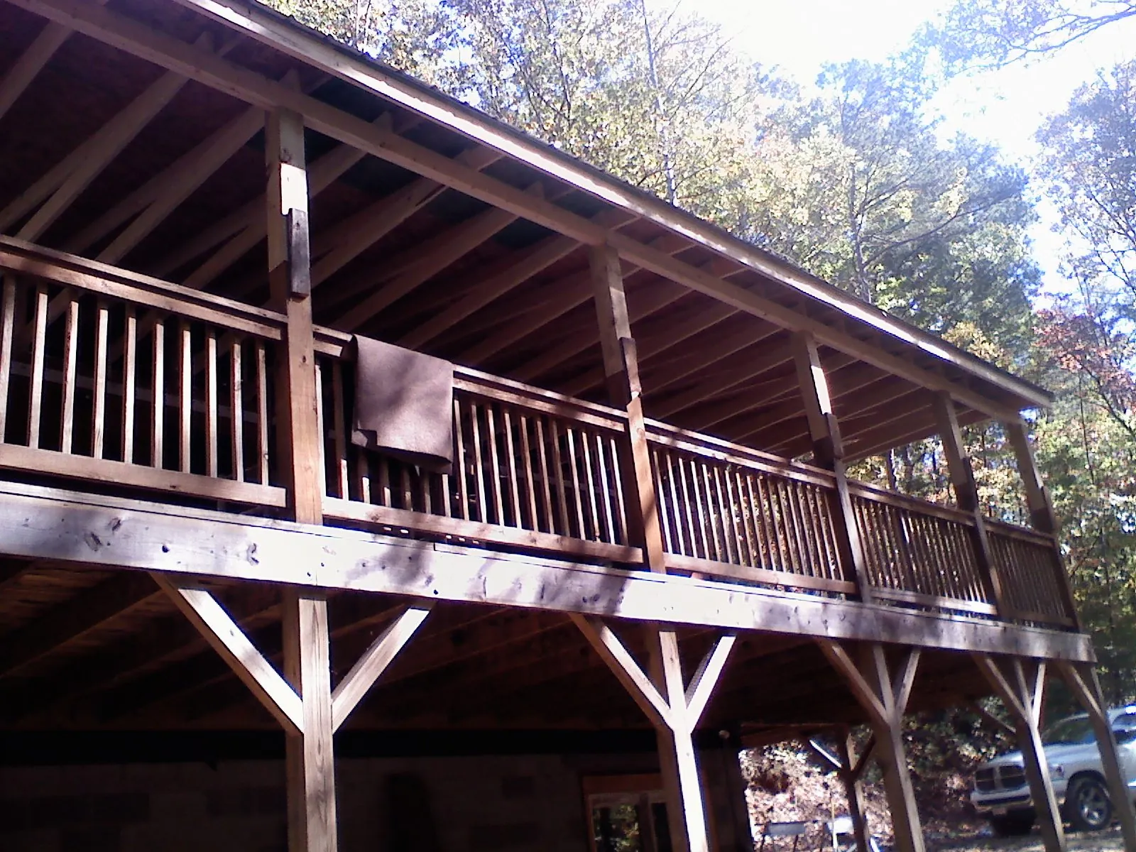 Timber framing under a new elevated porch and deck — Roof Leak Repair in Purchase by Roofing Brothers